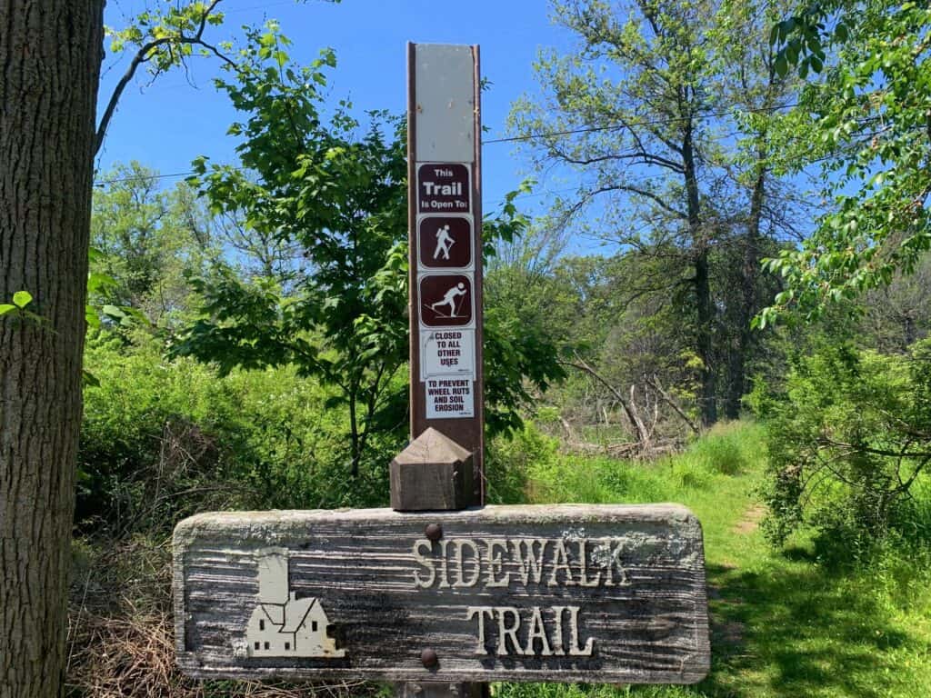 presque isle state park sidewalk trail sign