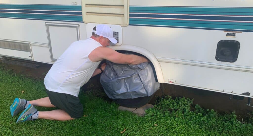 putting on rv tire covers 1