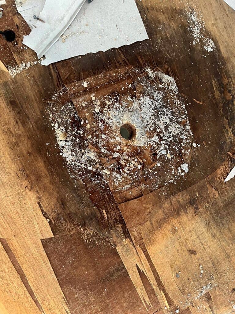 rv roof damage near antenna crank close up