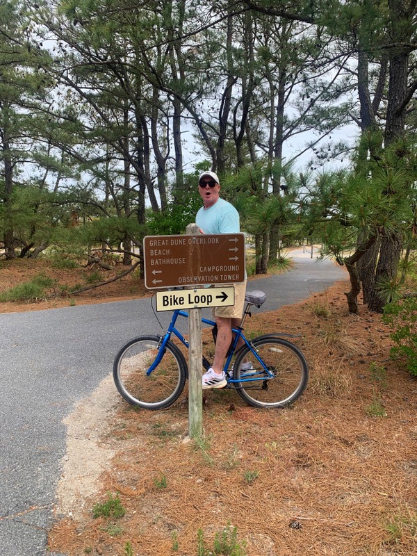 russ at bike loop sign in cape henlopen